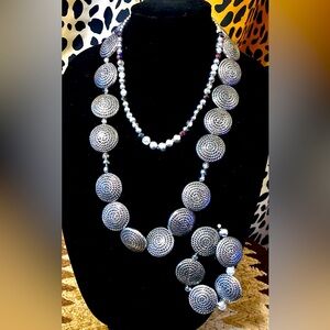 Chunky silver neck wear